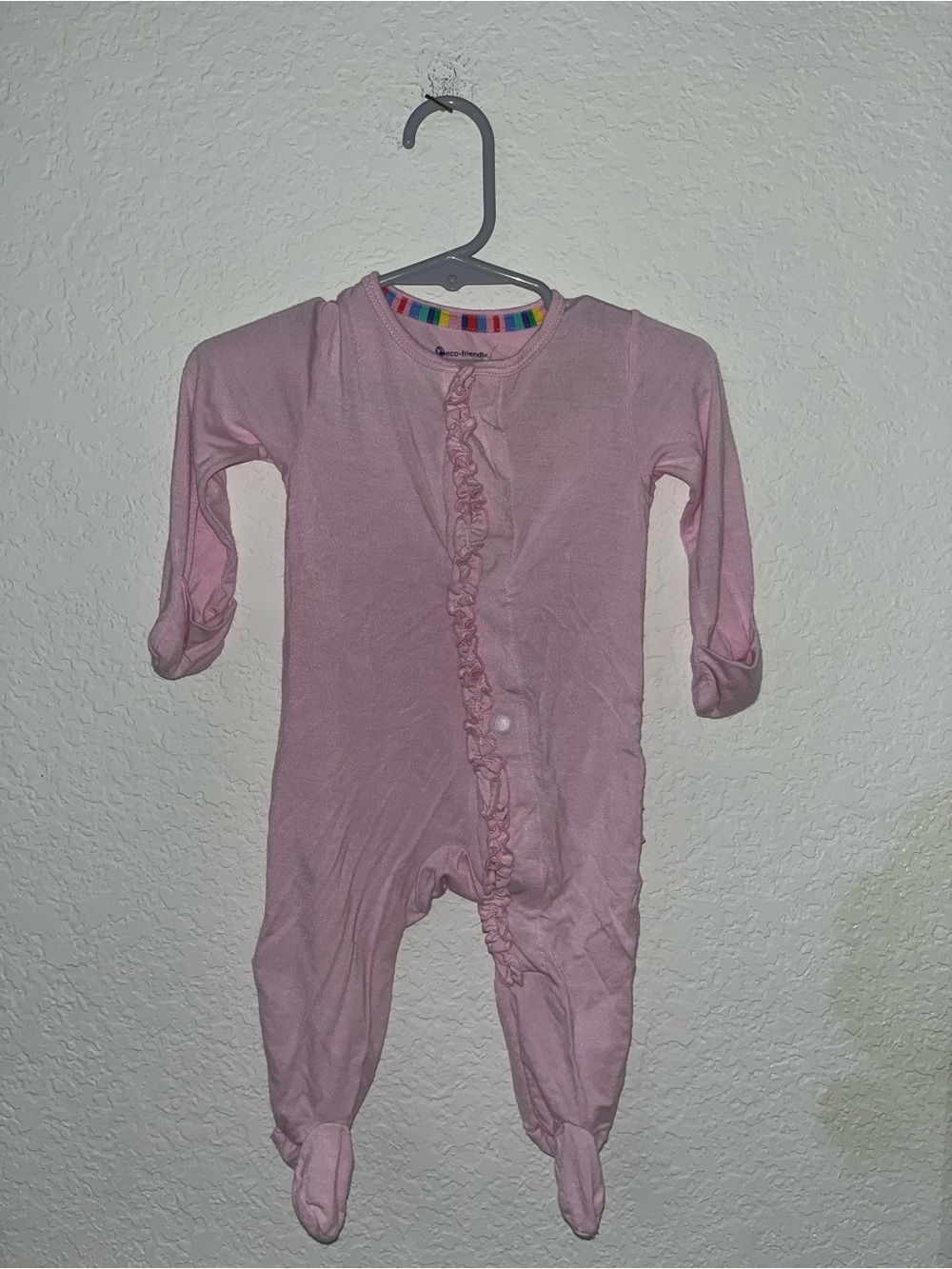 Magnetic Me baby pink ruffled footie pajamas